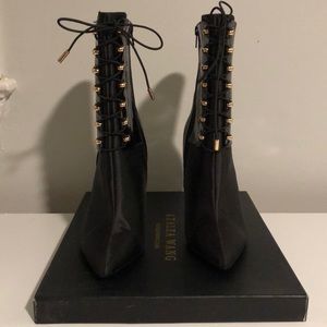 Black patent leather and satin calf boots